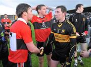 4 December 2011; Daithi Casey, Dr. Crokes, exchanges a handshake with Sean Kiely, UCC, after the game. AIB Munster GAA Football Senior Club Championship Final, Dr. Crokes v UCC, Fitzgerald Stadium, Killarney, Co. Kerry. Picture credit: Diarmuid Greene / SPORTSFILE