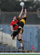 4 December 2011; Will Kennedy, UCC, in action against Ambrose O'Donovan, Dr. Crokes. AIB Munster GAA Football Senior Club Championship Final, Dr. Crokes v UCC, Fitzgerald Stadium, Killarney, Co. Kerry. Picture credit: Diarmuid Greene / SPORTSFILE