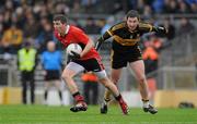 4 December 2011; Tom Clancy, UCC, in action against Daithi Casey, Dr. Crokes. AIB Munster GAA Football Senior Club Championship Final, Dr. Crokes v UCC, Fitzgerald Stadium, Killarney, Co. Kerry. Picture credit: Diarmuid Greene / SPORTSFILE