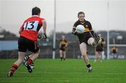 4 December 2011; Colm Cooper, Dr. Crokes, shoots to score a point despite pressure from Stephen O'Brien, UCC. AIB Munster GAA Football Senior Club Championship Final, Dr. Crokes v UCC, Fitzgerald Stadium, Killarney, Co. Kerry. Picture credit: Diarmuid Greene / SPORTSFILE