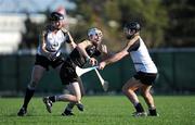 4 December 2011; Liam Watson, 2011 GAA GPA All-Stars, in action against Jackie Tyrrell, left, and J.J. Delaney, 2010 GAA GPA All-Stars. 2011 GAA GPA All-Stars Hurling Tour sponsored by Opel, 2010 GAA GPA All-Stars, white, v 2011 GAA GPA All-Stars, black jerseys, Treasure Island, San Francisco, California, USA. Picture credit: Ray McManus / SPORTSFIL