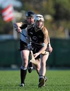 4 December 2011; Liam Watson, 2011 GAA GPA All-Stars, in action against Jackie Tyrrell, left, 2010 GAA GPA All-Stars. 2011 GAA GPA All-Stars Hurling Tour sponsored by Opel, 2010 GAA GPA All-Stars, white, v 2011 GAA GPA All-Stars, black jerseys, Treasure Island, San Francisco, California, USA. Picture credit: Ray McManus / SPORTSFILE