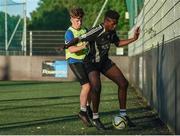 26 May 2017; Ronan O'Kelly, left, of Team Bray, Co. Wicklow, in action against Owen Omataje, of Team The Council, Tallaght, Co. Dublin, during the FAI South Dublin County Council Late Night League Finals at Astropark in Tallaght, Dublin. Photo by Seb Daly/Sportsfile
