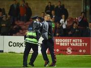 26 May 2017; A supporter is removed from the pitch by a member of An Garda Síochána during the SSE Airtricity League Premier Division match between Cork City and Shamrock Rovers at Turners Cross, in Cork.  Photo by Eóin Noonan/Sportsfile