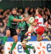 10 December 2011; Ray Ofisa, Connacht, in action against Rory Lawson, Gloucester. Heineken Cup, Pool 6, Round 3, Connacht v Gloucester, Sportsground, Galway. Picture credit: Pat Murphy / SPORTSFILE