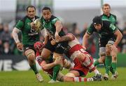 10 December 2011; Fetu'u Vainikolo, Connacht, is tackled by Luke Narraway and Jim Hamilton, right, Gloucester. Heineken Cup, Pool 6, Round 3, Connacht v Gloucester, Sportsground, Galway. Picture credit: Pat Murphy / SPORTSFILE