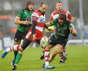 10 December 2011; Charlie Sharples, Gloucester, clears under pressure from John Muldoon, Connacht, to end the game. Heineken Cup, Pool 6, Round 3, Connacht v Gloucester, Sportsground, Galway. Picture credit: Pat Murphy / SPORTSFILE