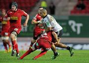 10 December 2011; Simon Zebo, Munster, is tackled by George North, Scarlets. Heineken Cup, Pool 1, Round 3, Scarlets v Munster, Parc Y Scarlets, Llanelli, Wales. Picture credit: Diarmuid Greene / SPORTSFILE