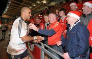 10 December 2011; Munster's Simon Zebo thanks supporters after victory over Scarlets. Heineken Cup, Pool 1, Round 3, Scarlets v Munster, Parc Y Scarlets, Llanelli, Wales. Picture credit: Diarmuid Greene / SPORTSFILE