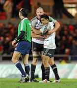 10 December 2011; Munster's Paul O'Connell, and Lifeimi Mafi celebrate after victory over Scarlets. Heineken Cup, Pool 1, Round 3, Scarlets v Munster, Parc Y Scarlets, Llanelli, Wales. Picture credit: Diarmuid Greene / SPORTSFILE