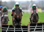 11 December 2011; Please Talk, with Paul Carberry up, jumps the last on their way to winning the 2012 Annual Membership Maiden Hurdle. Horse Racing, Punchestown, Co. Kildare. Picture credit: Matt Browne / SPORTSFILE