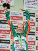 11 December 2011; Fionnuala Britton, Ireland, celebrates after being presented with her gold medal following her Senior Women's event victory at the 18th SPAR European Cross Country Championships 2011. Velenje, Slovenia. Picture credit: Stephen McCarthy / SPORTSFILE