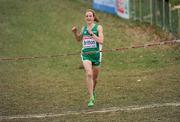 11 December 2011; Fionnuala Britton, Ireland, celebrates on her way to winning the Senior Women's event at the 18th SPAR European Cross Country Championships 2011. Velenje, Slovenia. Picture credit: Stephen McCarthy / SPORTSFILE