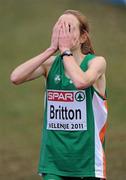 11 December 2011; Fionnuala Britton, Ireland, reacts after winning the Senior Women's event at the 18th SPAR European Cross Country Championships 2011. Velenje, Slovenia. Picture credit: Stephen McCarthy / SPORTSFILE