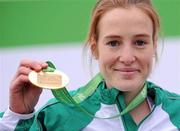 11 December 2011; Fionnuala Britton, Ireland, celebrates with her gold medal after winning the Senior Women's event at the 18th SPAR European Cross Country Championships 2011. Velenje, Slovenia. Picture credit: Stephen McCarthy / SPORTSFILE