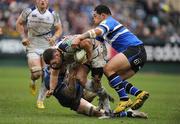 11 December 2011; Fergus McFadden, Leinster, is tackled by Ryan Caldwell, left, and Anthony Perenise, Bath. Heineken Cup Pool 3 Round 3, Bath v Leinster, The Rec, Bath, England. Picture credit: Brendan Moran / SPORTSFILE