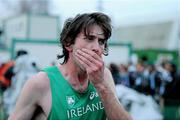 11 December 2011; Joseph Sweeney, Ireland, reacts after his fifth place finish in the Senior Men's event at the 18th SPAR European Cross Country Championships 2011. Velenje, Slovenia. Picture credit: Stephen McCarthy / SPORTSFILE