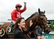 27 May 2017; Chris Hayes celebrates as he enters the winner's enclosure on Gordon led in by Jessica Maguire, daughter of owner Morgan Cahalan, after winning the Weatherbys Ireland Greenlands Stakes at Tattersalls Irish Guineas Festival at The Curragh, Co Kildare. Photo by Cody Glenn/Sportsfile