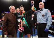 26 May 2017; Michael Conlan celebrates with his daughter Luisne and promoter Bob Arum, left, following his bout against Alfredo Chanez at the UIC Pavilion in Chicago, USA. Photo by Mikey Williams/Top Rank/Sportsfile