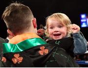 26 May 2017; Michael Conlan celebrates with his daughter Luisne following his bout against Alfredo Chanez at the UIC Pavilion in Chicago, USA. Photo by Mikey Williams/Top Rank/Sportsfile