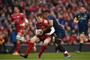 27 May 2017; Rhys Patchell of Scarlets is tackled by Francis Saili of Munster during the Guinness PRO12 Final between Munster and Scarlets at the Aviva Stadium in Dublin. Photo by Ramsey Cardy/Sportsfile