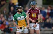 27 May 2017; Shane Dooley of Offaly and Tommy Doyle of Westmeath tussle during the Leinster GAA Hurling Senior Championship Quarter-Final match between Westmeath and Offaly at TEG Cusack Park in Mullingar, Co Westmeath. Photo by Piaras Ó Mídheach/Sportsfile