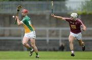27 May 2017; Emmett Nolan of Offaly in action against Conor Shaw of Westmeath during the Leinster GAA Hurling Senior Championship Quarter-Final match between Westmeath and Offaly at TEG Cusack Park in Mullingar, Co Westmeath. Photo by Piaras Ó Mídheach/Sportsfile