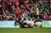 27 May 2017; Andrew Conway of Munster scores his side's second try despite the efforts of Jonathan Davies of Scarlets during the Guinness PRO12 Final between Munster and Scarlets at the Aviva Stadium in Dublin. Photo by Diarmuid Greene/Sportsfile