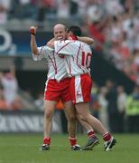 4 September 2005; Peter Canavan, right, Tyrone, celebrates at the end of the game with team-mate Brian Dooher, after his late point secured victory over Armagh. Bank of Ireland All-Ireland Senior Football Championship Semi-Final, Armagh v Tyrone, Croke Park, Dublin. Picture credit; David Maher / SPORTSFILE