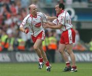 4 September 2005; Peter Canavan, left, Tyrone, celebrates at the end of the game with team-mate Brian Dooher, after his late point secured victory over Armagh. Bank of Ireland All-Ireland Senior Football Championship Semi-Final, Armagh v Tyrone, Croke Park, Dublin. Picture credit; David Maher / SPORTSFILE