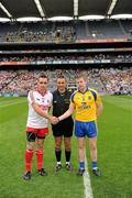30 July 2011; Tyrone captain Ryan McMenamin, left, and Roscommon captain Peter Domican, right, with refereeMaurice Deegan before the game. GAA Football All-Ireland Senior Championship Qualifier, Round 4, Roscommon v Tyrone, Croke Park, Dublin. Picture credit: Ray McManus / SPORTSFILE