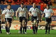 10 December 2011; Munster's Ronan O'Gara, Donnacha Ryan, Paul O'Connell and Niall Ronan make their way up the pitch for a line-out. Heineken Cup, Pool 1, Round 3, Scarlets v Munster, Parc Y Scarlets, Llanelli, Wales. Picture credit: Diarmuid Greene / SPORTSFILE