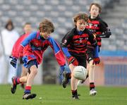 13 December 2011; Eoghan Doody of Belgrove BNS, Clontarf, in action against Jamie Dooney of St. Colmcille's SNS, Knocklyon during the Allianz Cumann na mBunscol Finals match between Corn Kitterick, Belgrove BNS, Clontarf and St. Colmcille's SNS, Knocklyon at Croke Park in Dublin. Photo by Brian Lawless/Sportsfile