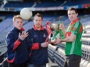 13 December 2011; St. Brigid's Shane Supple, left, and Barry Cahill, centre, with Garrycastle captain John Gaffney, right, and the Sean McCabe Cup at a photocall ahead of the AIB Leinster GAA Football Senior Club Championship Final, St Brigid's, Dublin v Garrycastle, Westmeath, on Sunday. AIB Leinster GAA Football Senior Club Championship Final Photocall, Croke Park, Dublin. Picture credit: Pat Murphy / SPORTSFILE