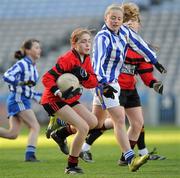 13 December 2011; Ann Dalton, St. Colmcille's S.N.S, Knocklyon, in action against Eibhlin Ní Dhuinnshléibhe, Gaelscoil Chnoc Liamna. Allianz Cumann na mBunscol Finals, Corn Irish Rubies, Gaelscoil Chnoc Liamna v St. Colmcille's S.N.S, Knocklyon, Croke Park, Dublin. Picture credit: Brian Lawless / SPORTSFILE