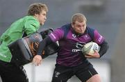 15 December 2011; Connacht's Brett Wilkinson gets away from Dylan Rogers during squad training ahead of their Heineken Cup, Pool 6, Round 4, match against Gloucester on Saturday. Connacht Rugby Squad Training, Sportsground, Galway. Picture credit: Diarmuid Greene / SPORTSFILE
