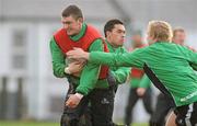 15 December 2011; Connacht's David McSharry is tackled by Miah Nikora, and Aaron Conneely, right, during squad training ahead of their Heineken Cup, Pool 6, Round 4, match against Gloucester on Saturday. Connacht Rugby Squad Training, Sportsground, Galway. Picture credit: Diarmuid Greene / SPORTSFILE