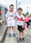 28 May 2017; 5 year old Tyrone supporter Tommy, left, and brother 6 year old Derry supporter John-Joe Loughran ahead of the Ulster GAA Football Senior Championship Quarter-Final match between Derry and Tyrone at Celtic Park in Derry. Photo by Ramsey Cardy/Sportsfile