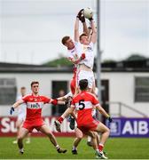 28 May 2017; Daniel Millar, left, and Ruairi Gormley of Tyrone in action against Padraig McGrogan of Derry during the Electric Ireland GAA Ulster GAA Football Minor Championship Quarter-Final match between Derry and Tyrone at Celtic Park in Derry. Photo by Ramsey Cardy/Sportsfile