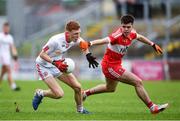 28 May 2017; Daniel Millar of Tyrone in action against Simon McErlain of Derry during the Electric Ireland GAA Ulster GAA Football Minor Championship Quarter-Final match between Derry and Tyrone at Celtic Park in Derry. Photo by Ramsey Cardy/Sportsfile