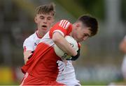 28 May 2017, Patrick Quigg of Derry in action against Antoin Fox of Tyrone  during the Electric Ireland GAA Ulster GAA Football Minor Championship Quarter-Final game between Derry and Tyrone at Celtic Park, in Derry. Photo by Oliver McVeigh/Sportsfile