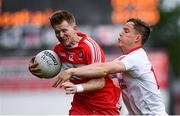 28 May 2017; Enda Lynn of Derry in action against Kieran McGeary of Tyrone during the Ulster GAA Football Senior Championship Quarter-Final match between Derry and Tyrone at Celtic Park in Derry. Photo by Ramsey Cardy/Sportsfile