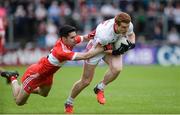 28 May 2017; Peter Harte of Tyrone in action against Niall Keenan of Derry during the Ulster GAA Football Senior Championship Quarter-Final match between Derry and Tyrone at Celtic Park, in Derry.  Photo by Oliver McVeigh/Sportsfile