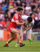 28 May 2017; Rory Brennan of Tyrone is tackled by Niall Keenan of Derry during the Ulster GAA Football Senior Championship Quarter-Final match between Derry and Tyrone at Celtic Park in Derry. Photo by Ramsey Cardy/Sportsfile