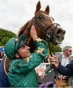 28 May 2017; Jockey Andrea Atzeni celebrates after winning the Tattersalls Gold Cup on Decorated Knight at Tattersalls Irish Guineas Festival at The Curragh, Co Kildare. Photo by Cody Glenn/Sportsfile