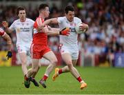 28 May 2017; Matthew Donnelly of Tyrone  in action against Niall Loughlin of Derry during the Ulster GAA Football Senior Championship Quarter-Final match between Derry and Tyrone at Celtic Park, in Derry.  Photo by Oliver McVeigh/Sportsfile