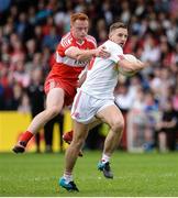 28 May 2017; Niall Sludden of Tyrone  in action against Conor McAtamney of Derry  during the Ulster GAA Football Senior Championship Quarter-Final match between Derry and Tyrone at Celtic Park, in Derry.  Photo by Oliver McVeigh/Sportsfile