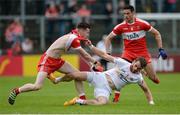 28 May 2017; Niall Loughlin of Derry tussels with Ronan McNamee of Tyrone during the Ulster GAA Football Senior Championship Quarter-Final match between Derry and Tyrone at Celtic Park, in Derry.  Photo by Oliver McVeigh/Sportsfile