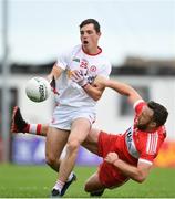 28 May 2017; David Mulgrew of Tyrone is tackled by Emmett McGuckin of Derry during the Ulster GAA Football Senior Championship Quarter-Final match between Derry and Tyrone at Celtic Park in Derry. Photo by Ramsey Cardy/Sportsfile