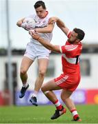 28 May 2017; David Mulgrew of Tyrone is tackled by Emmett McGuckin of Derry during the Ulster GAA Football Senior Championship Quarter-Final match between Derry and Tyrone at Celtic Park in Derry. Photo by Ramsey Cardy/Sportsfile